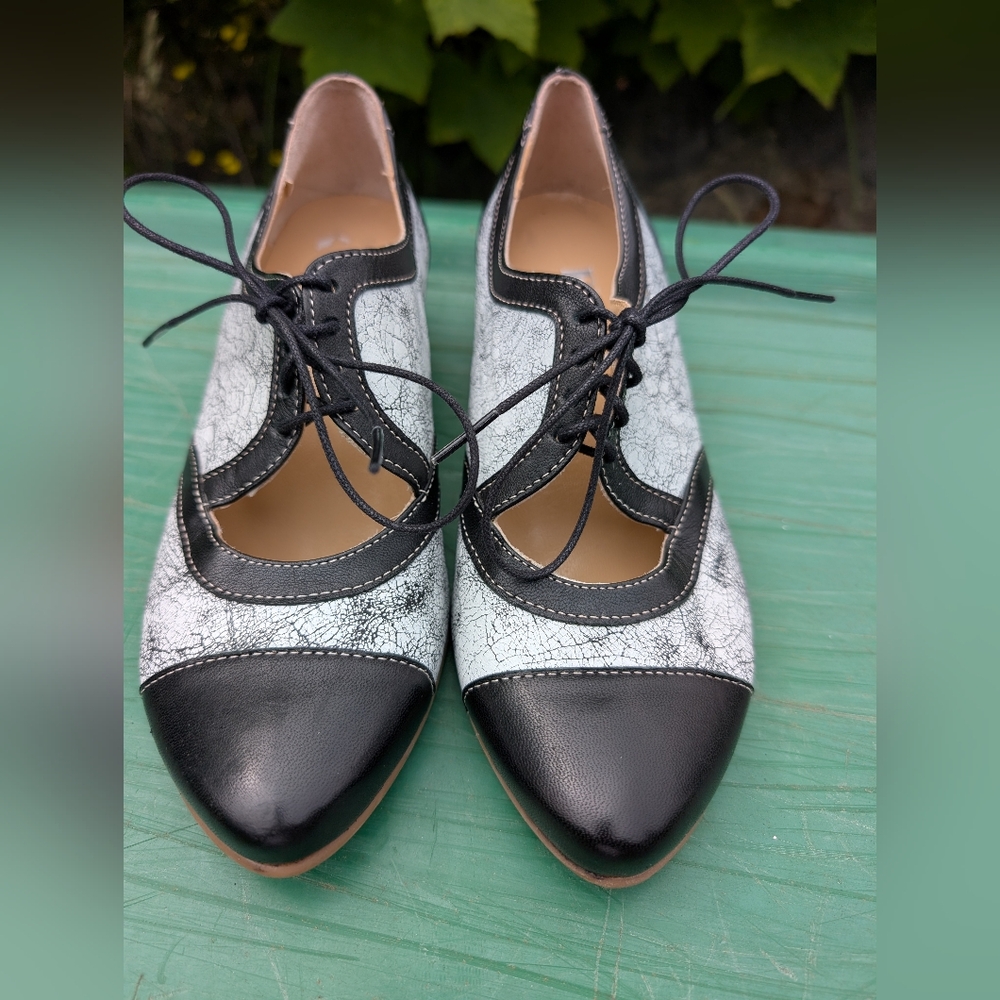 Black and White Heels with Classic Design and Minimal Heel